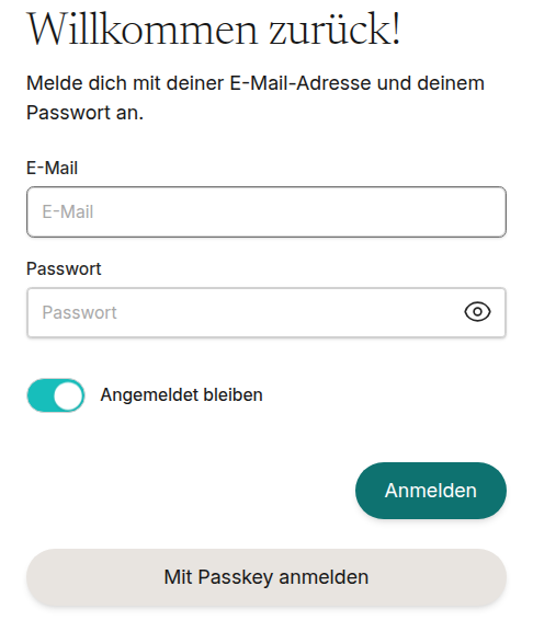 Signing in to ADze with the “Sign in with a passkey” button below email and password